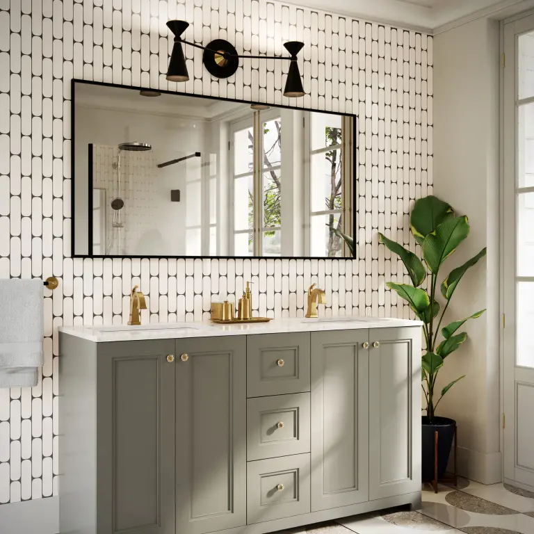 Elegant bathroom with a black and white theme, featuring a double vanity and patterned wall tiles.